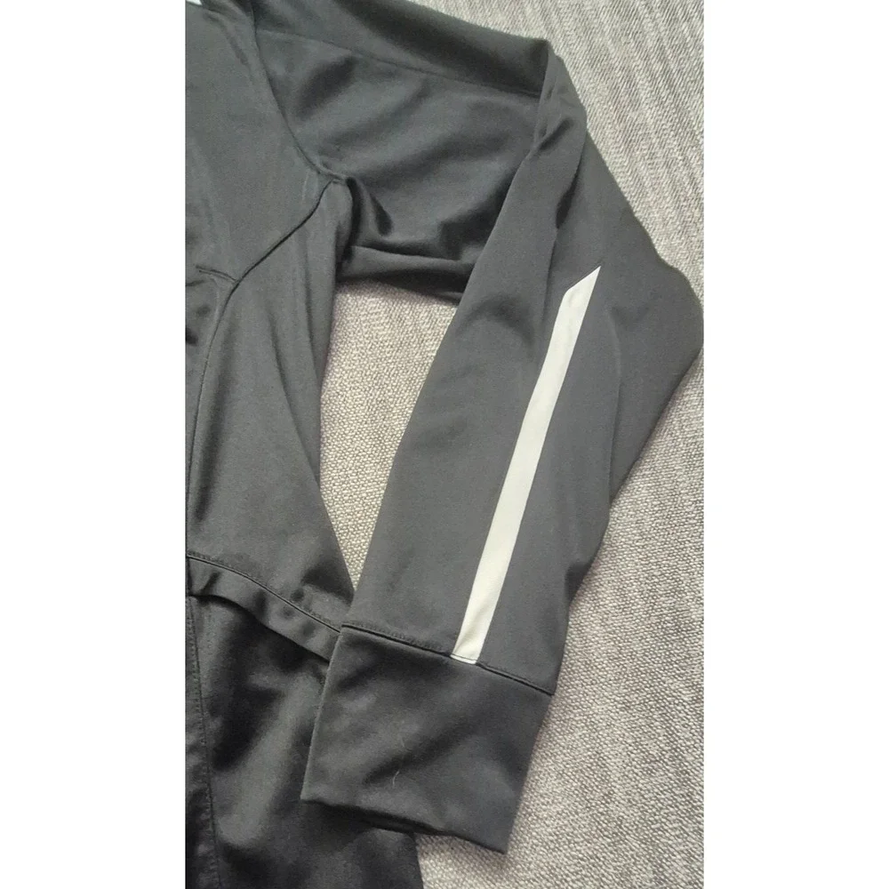 Nike women's black track jacket LG full zip pockets white piping athletic sports